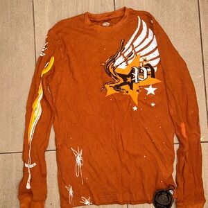 Rust Orange Graphic Thermal Tee with Wing & Star Design